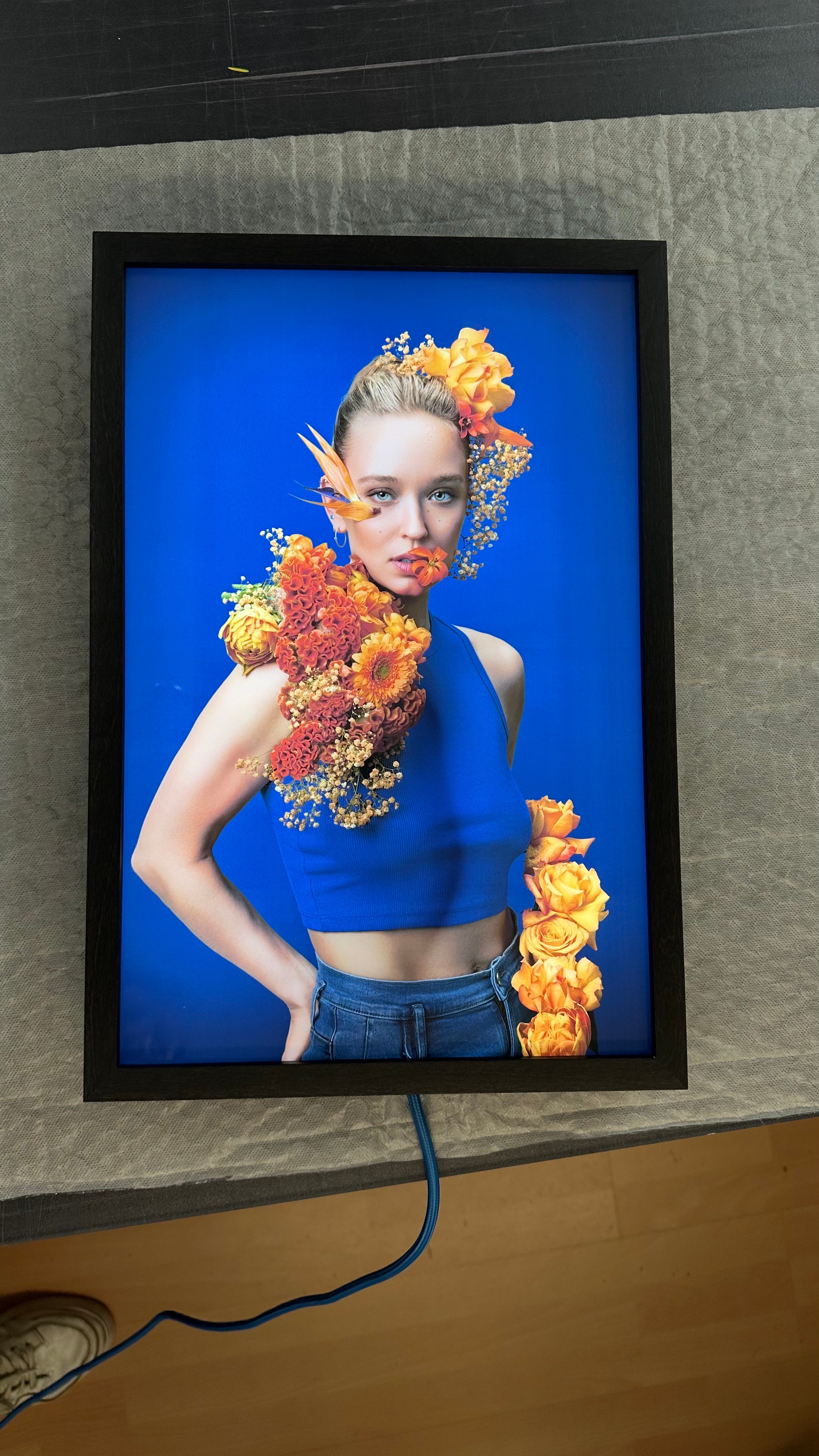 Hinterleuchteter Leuchtkasten mit Portraitfotografie